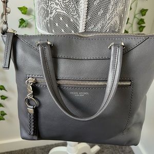 Henri bendell grey leather purse with long strap.
